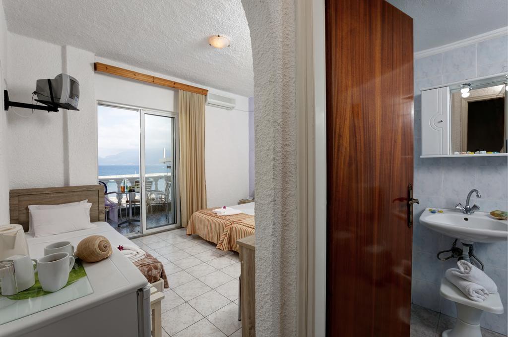 Dreibettzimmer mit Meerblick
